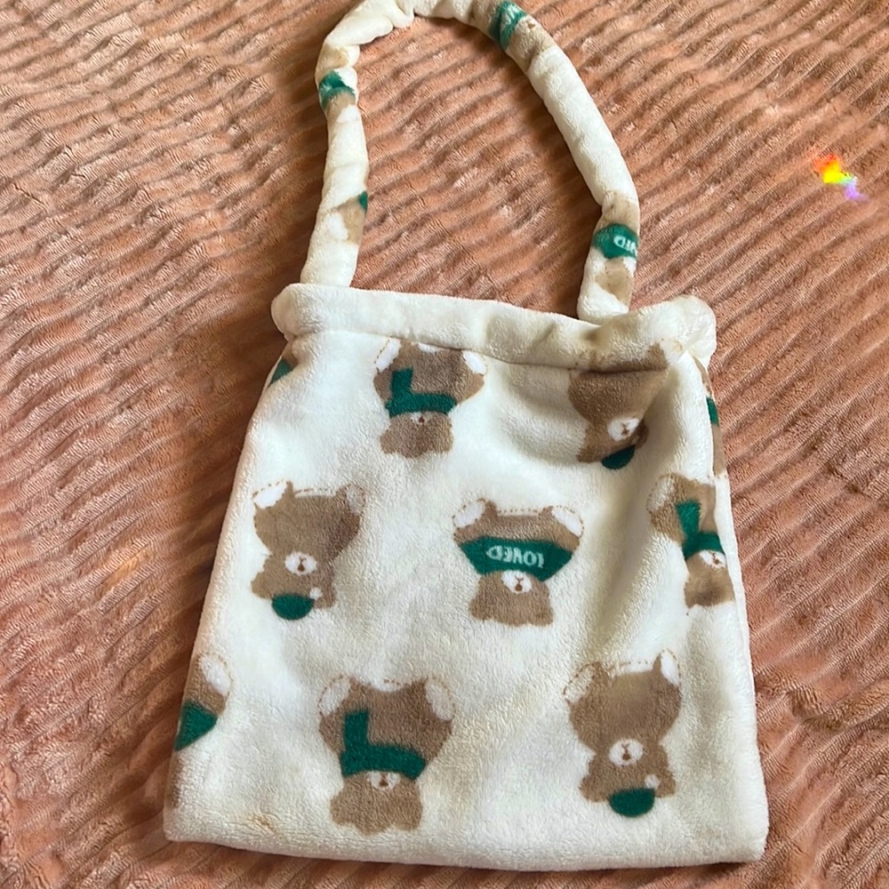 This is a soft teddy bear bag